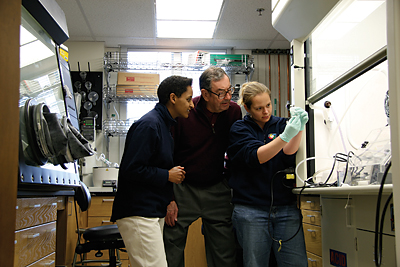 Sossina Haile, Professor of Materials Science and of Chemical Engineering, Harry Gray, Arnold O. Beckman Professor of Chemistry, and graduate student Lisa Cowan.