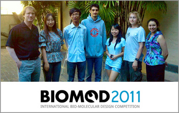 Team "DeoxyriboNucleicAwesome" is shown with their faculty mentor, Erik Winfree (left) and postdoc mentor, Lulu Qian (2nd from the left). The group, from left to right after Qian, is: Zibo Chen, Shayan Doroudi, Yae Lim Lee, Gregory Izatt, and Sarah Wittman.